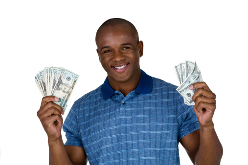 Happy man holding cash and isolated on white background 
