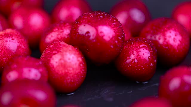 delicious sweet cherries on a slate board