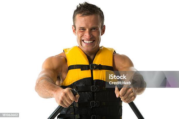 Portrait Of A Happy Young Man Canoeing Stock Photo - Download Image Now - 20-29 Years, Adult, Adults Only