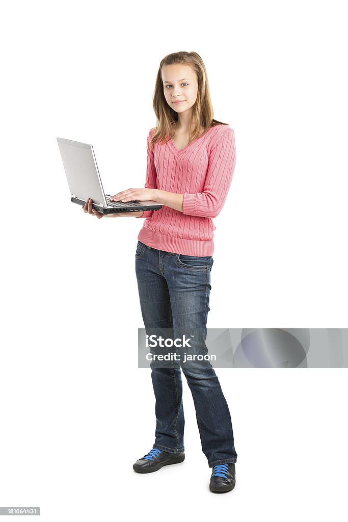 teenager girl standing with laptop teenager girl standing isolated on white 14-15 Years Stock Photo