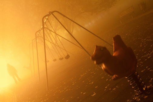 Stranger on playground on a foggy night