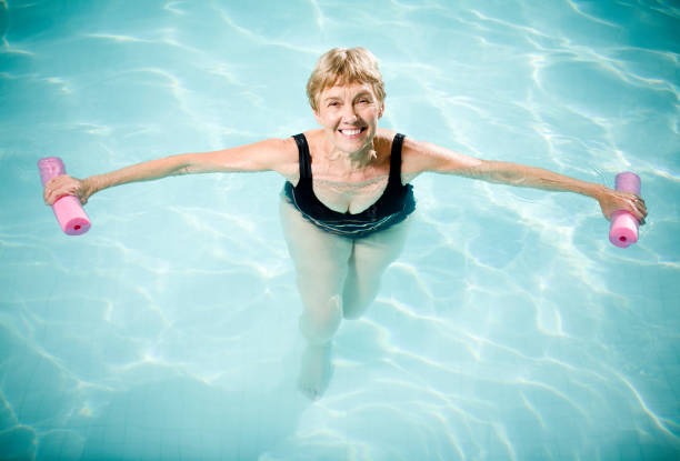 istock Active Senior Woman Aquasizing 181064605