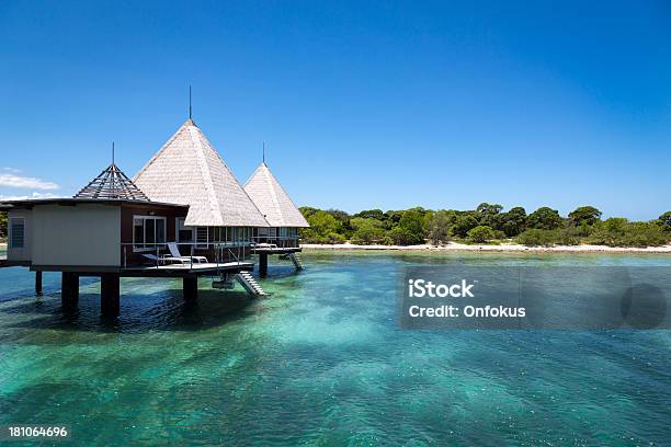 Tropical Paradise Luxury Over Water Bungalow Resort Stock Photo - Download Image Now