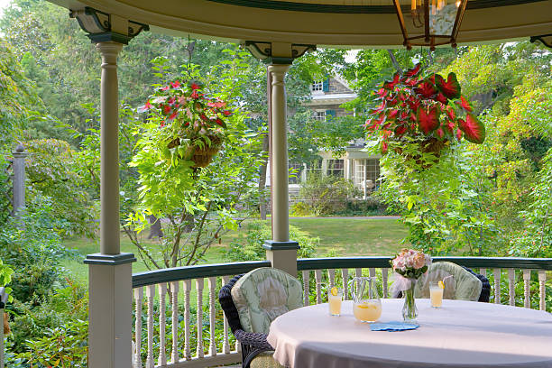 istock Summertime Victorian Porch 181064785