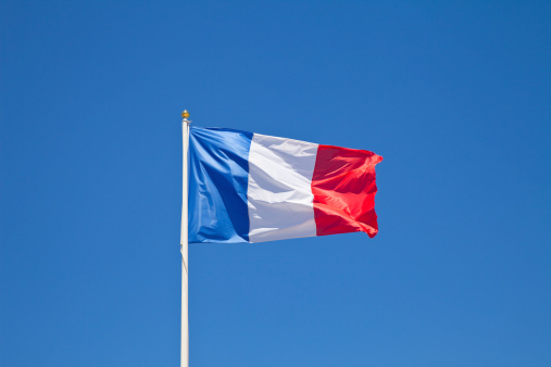 French flag (tricolore) over the harbor of La Ciotat
