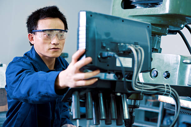 istock A male milling machine operator in safety glasses 181065429