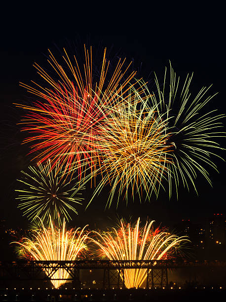 istock Multi-coloured bursts of fireworks behind High Level Bridge. 181065482