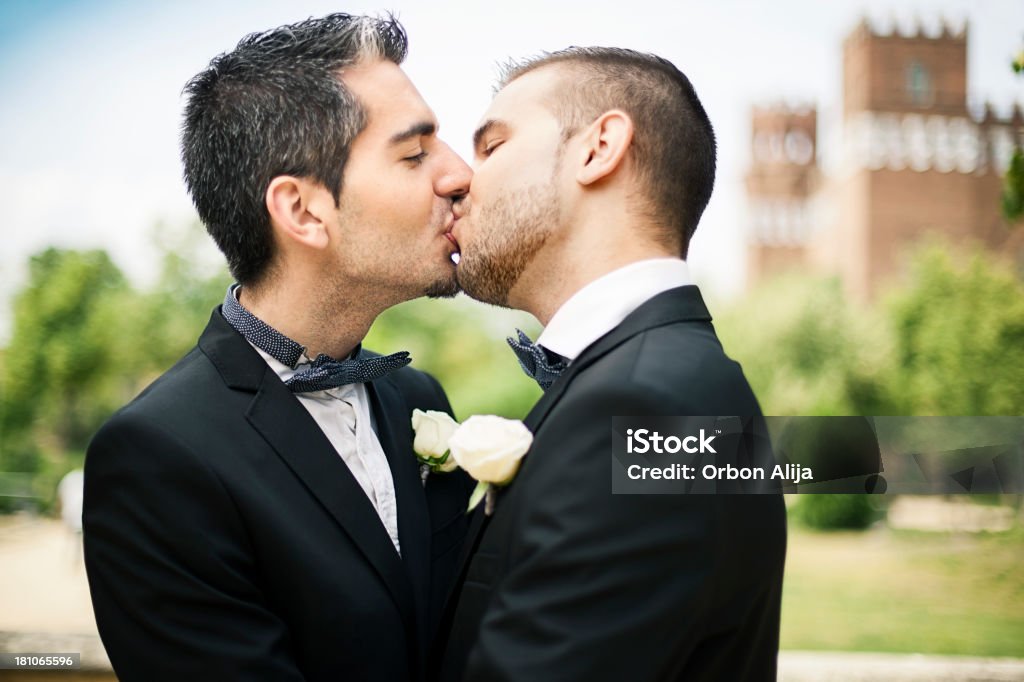 Portrait of Gay Couple Portrait of Gay Couple kissing after getting married 20-24 Years Stock Photo