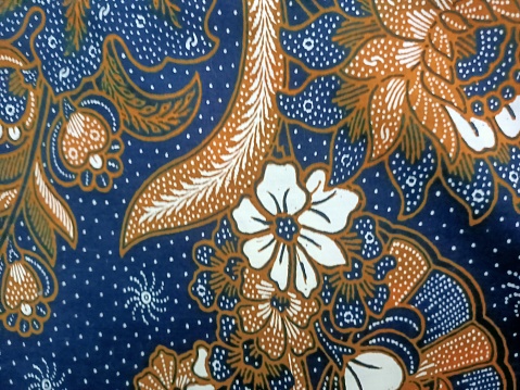 texture of batik print fabric striped colourful  flowers background.Malaysian culture batik cloth. photo taken in malaysia