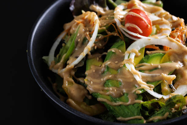 Japanese salad isolated in black background