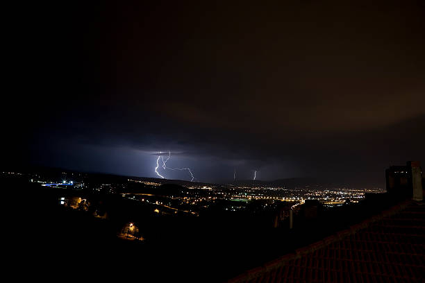 istock lightning over the city 181065858