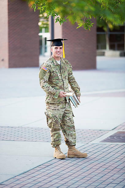 istock American Soldier with graduation hat 181065900