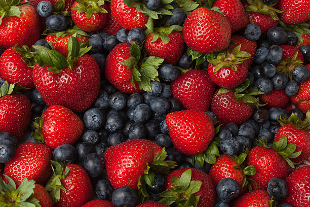 Strawberries and Blueberries stock photo