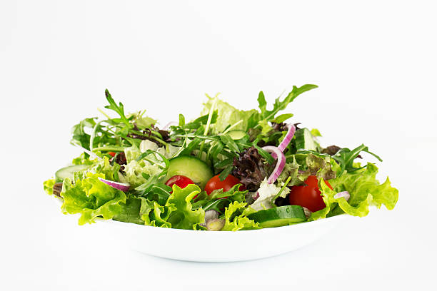 istock Plate of salad on white 181067106