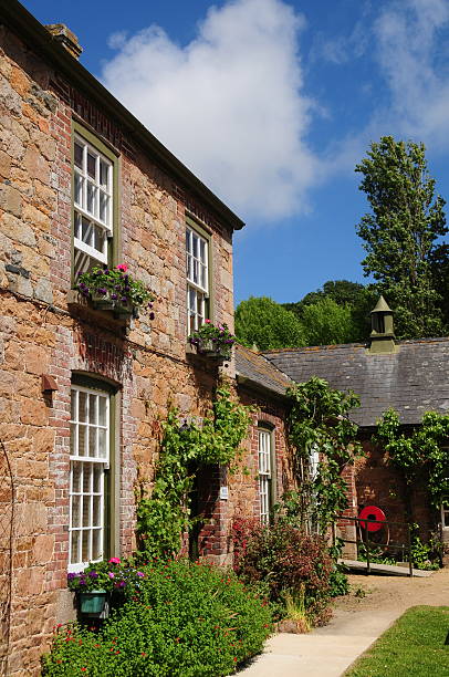 istock Jersey farmhouse, U.K. 181067926