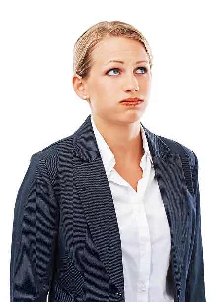 A young businesswoman looking bored and frustrated