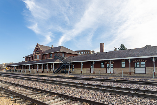 Mankato, Minnesota, USA - November 19, 2023: View of the Mankato Union Depot, a historic passenger railway station built in 1896 by the Chicago and North Western Railway. The architect and builder was J. B. Nelson & Co. The building no longer serves as a passenger station, instead housing local shops and businesses. It was listed on the National Register of Historic Places in 1980.