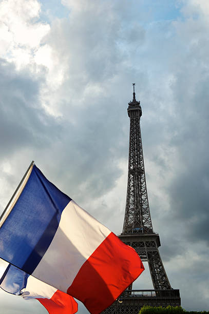 istock French Flags Fly in front of Eiffel Tower Paris France 181069076