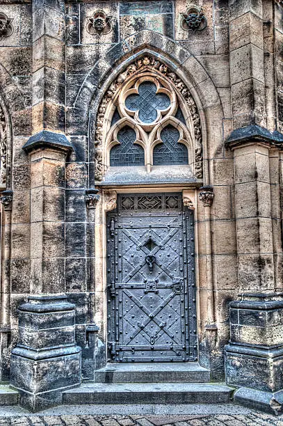 Photo of HDR Image ancient metal door and walls of church