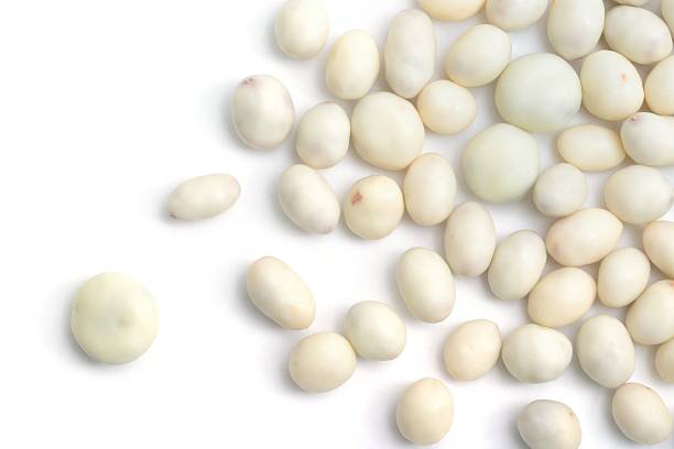 istock Yogurt coated peanuts and raisins scattered 181070053