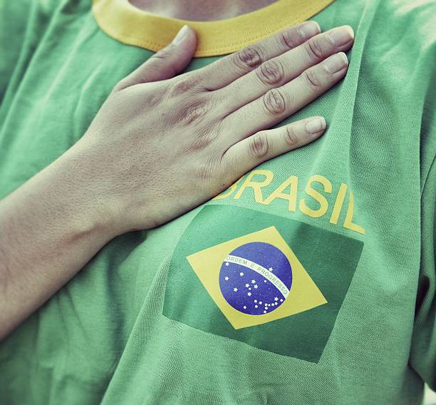 istock Brasilian Fan Putting Hand on Hearth During the National Anthem 181070073