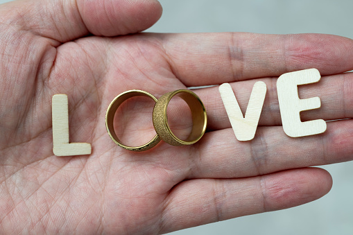 Wedding rings with word love