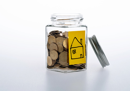 Coin jar with house label