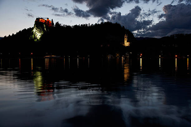 istock Bled Castle and church illuminated after sunset 181070551