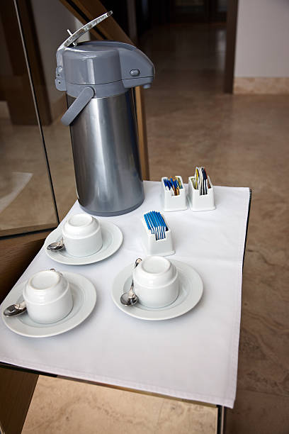 istock Hot water thermos flask and crockery on tray 181070754