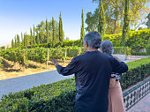 Elderly couple enjoys the vineyard