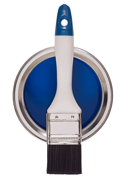 istock Paintbrush on a tin of blue paint 181071254