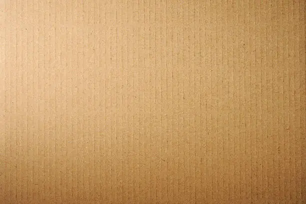 Photo of Close-up of brown cardboard texture background