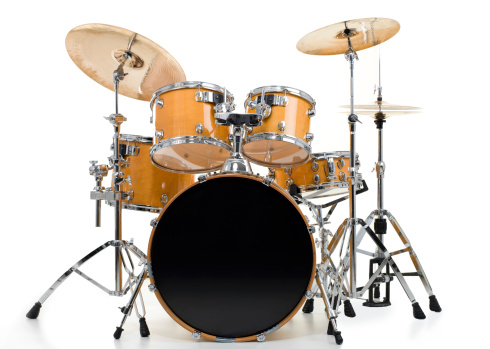 Set of yellow drums isolated on white background.