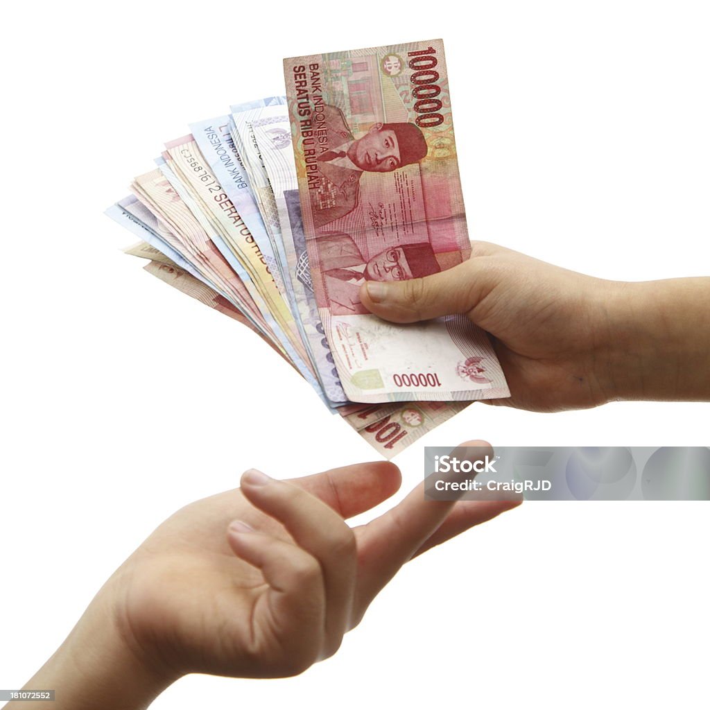 Indonesian Payment A large payment in Indonesian cash Indonesian Currency Stock Photo