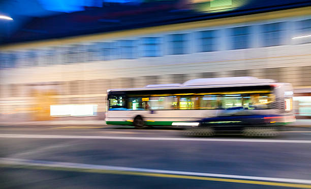 istock Bus driving on city street 181072697