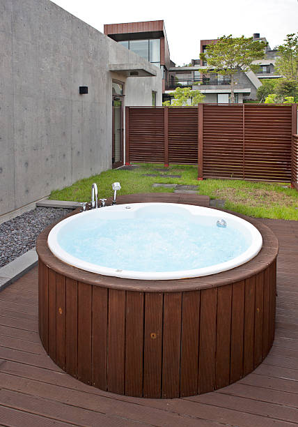 istock beautiful house with hot tub 181072809