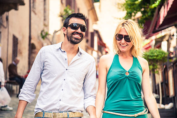 istock Elegant couple downtown shopping in spring 181073379