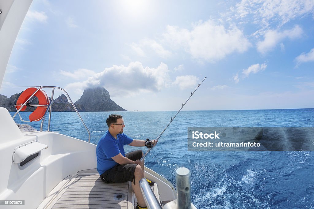 Pesca no belo mar azul - Foto de stock de Adulto royalty-free