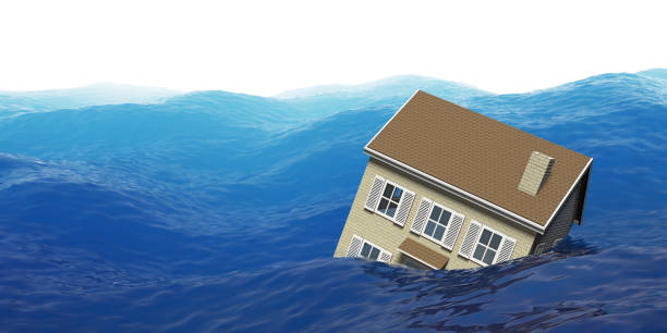House floating in ocean during a flood stock photo