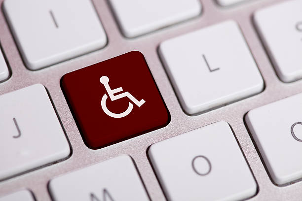 istock Wheelchair on a Laptop Key 181074815