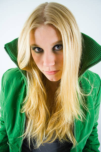 istock Blonde girl looking at camera 181075032
