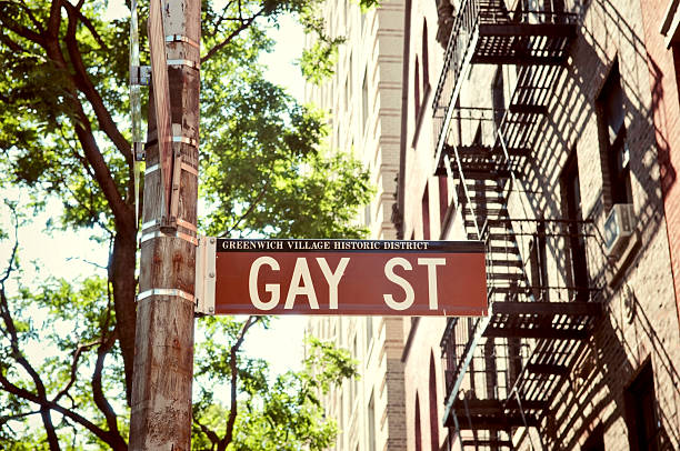 gay street - homosexual gay man pride greenwich village photos et images de collection