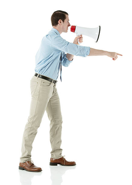 istock Side view of a businessman speaking on megaphone 181075619