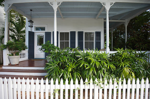 istock White Picket Fence Traditional Front Porch Southern Style 181075708