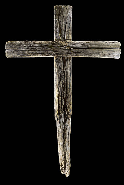 istock Wooden crucifix cross on black background 181076099