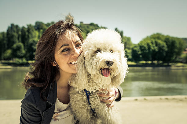 istock Young Woman with Dog 181076616