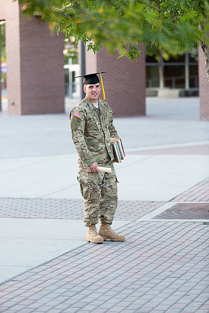 istock American Soldier with graduation hat 181076838
