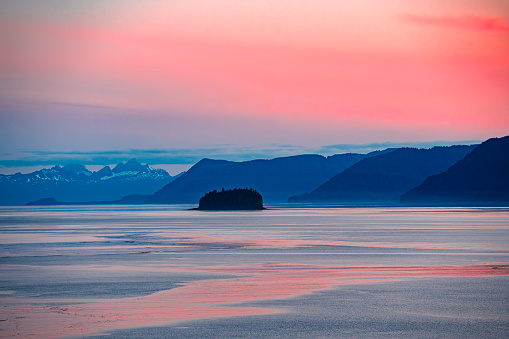 landscape of mountain, island in sea with amazing sunset with dramatic color sky