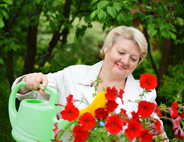 istock mature woman in nature 181077405