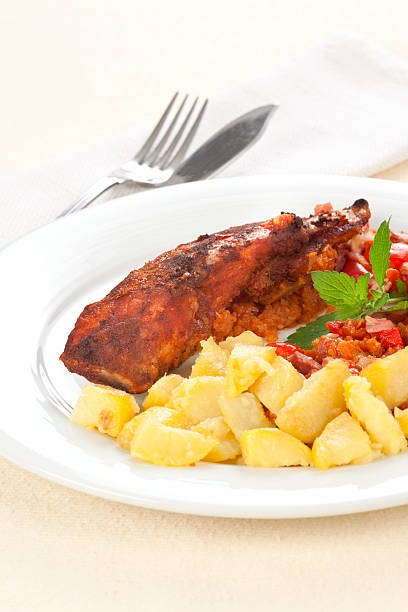 istock Lunch with baked carp and potatoes 181077820